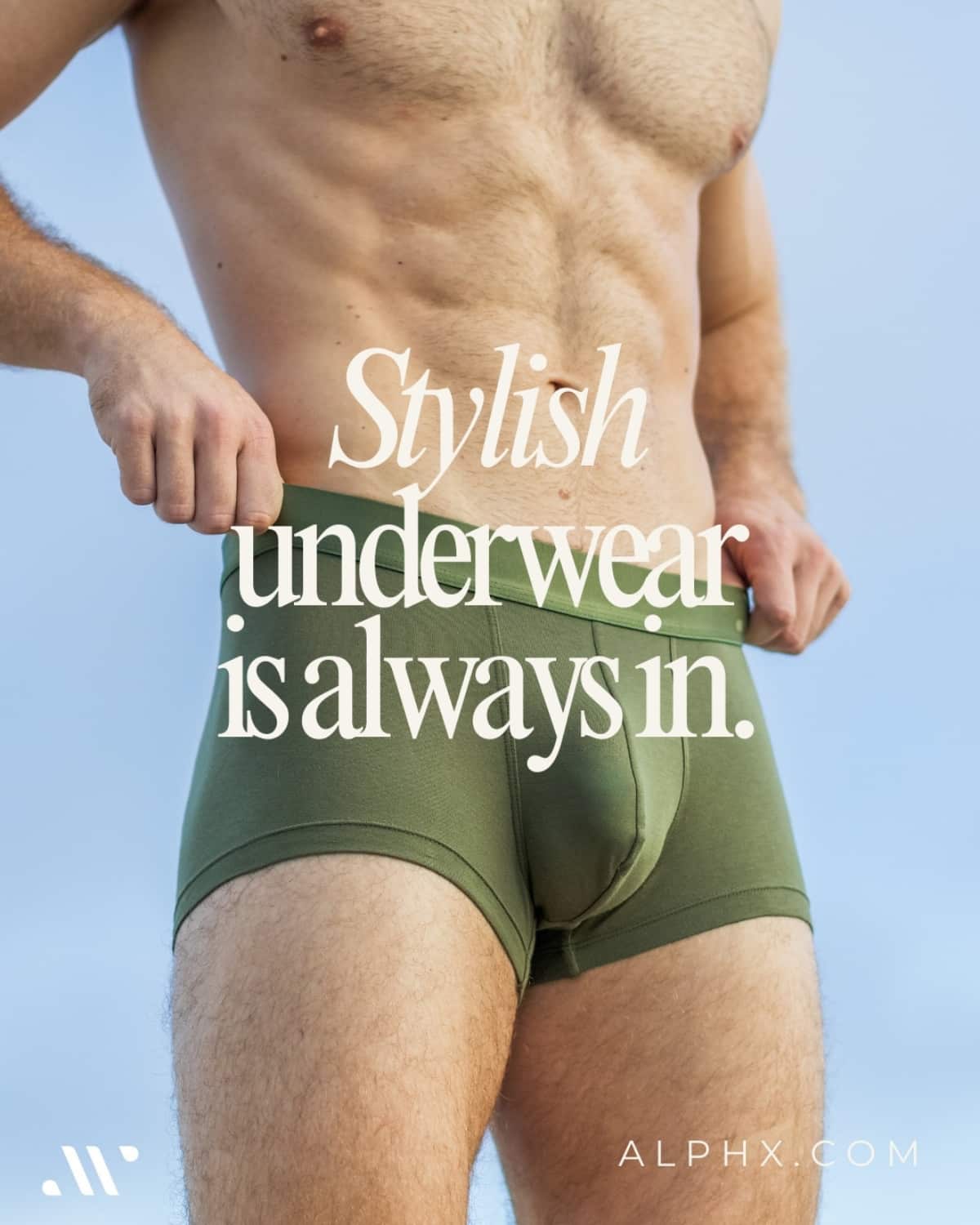 Man wearing green underwear with text 'Stylish underwear is always in' and brand logo on a clear blue sky background.