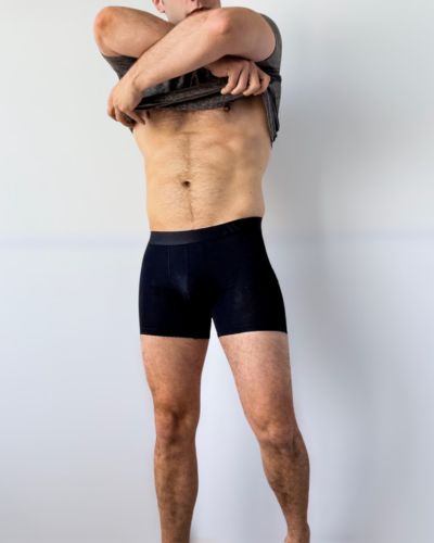 Man wearing ALPHX Black Boxer Brief MOD Fit against a plain background