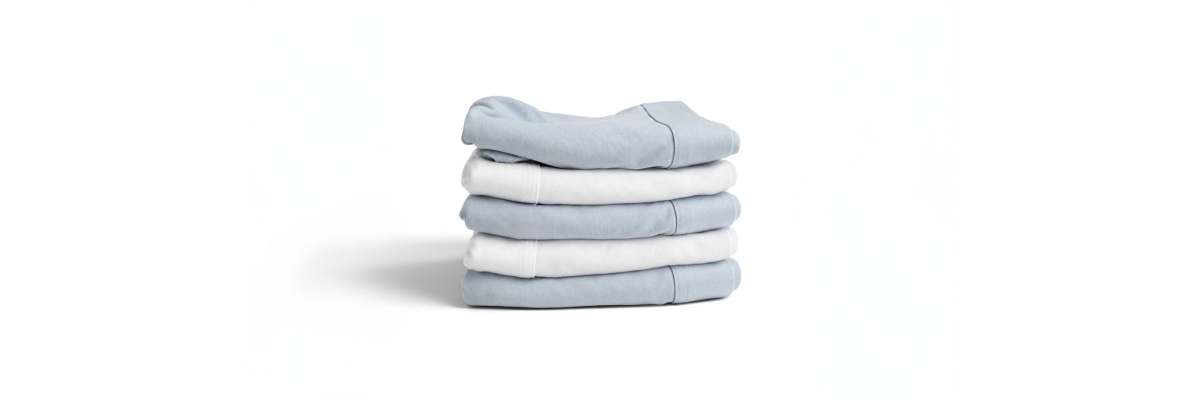 Stacked folded ALPHX premium underwear in white and blue 
