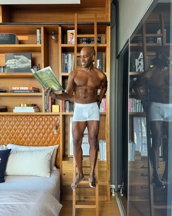 Man wearing ALPHX white boxer brifs in medium on ladder