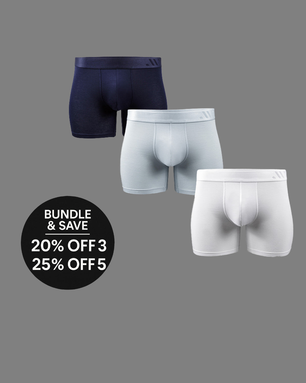Three pairs of men's boxer briefs in black, gray, and white on a gray background with promotional text.