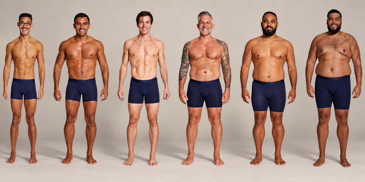 Six men standing side by side wearing ALPHX Modern Fit Boxer Briefs, one for each size from XS to 2XL, showing how each waist size fits different body types